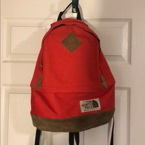 The North Face red backpack